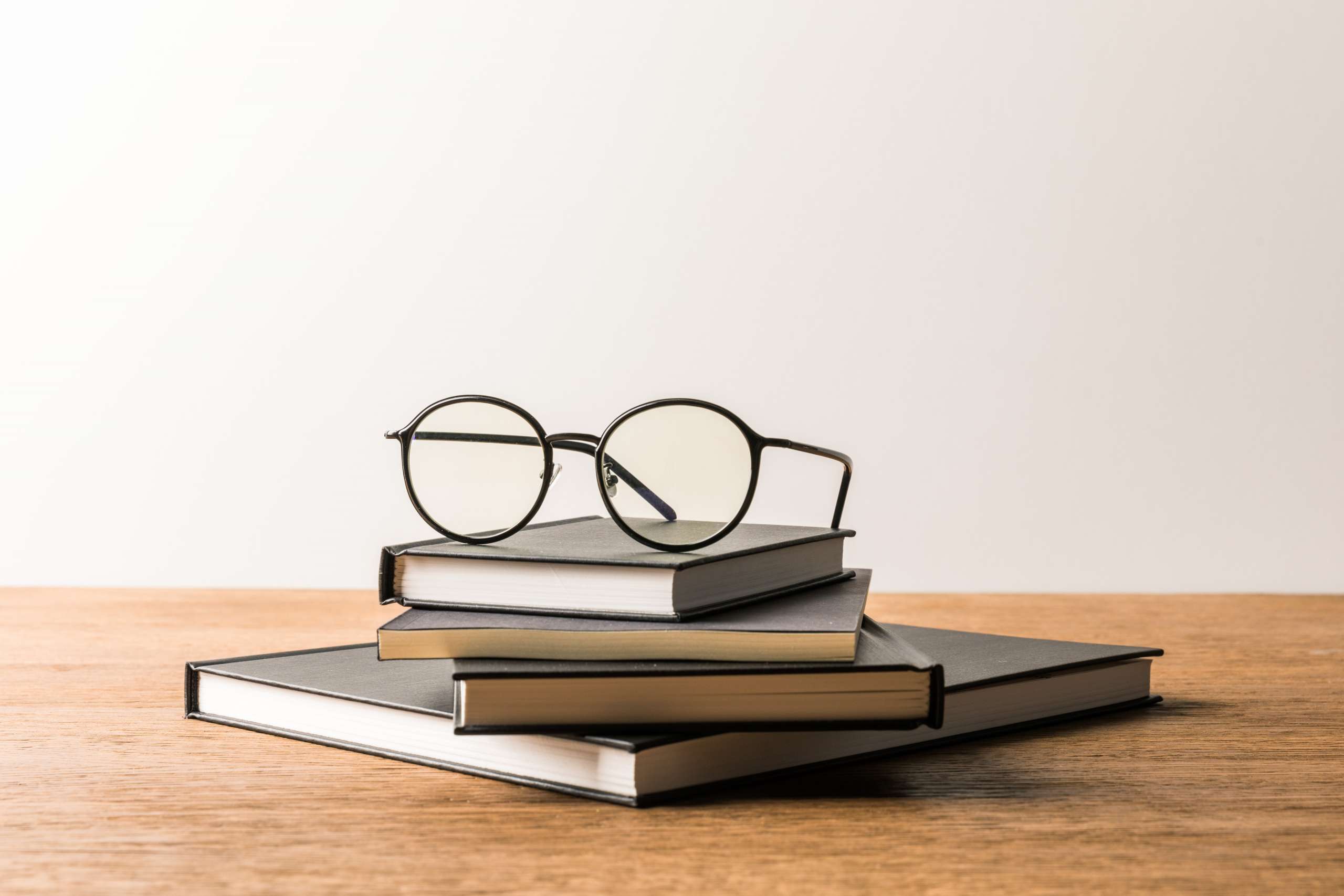 notebooks and eyeglasses